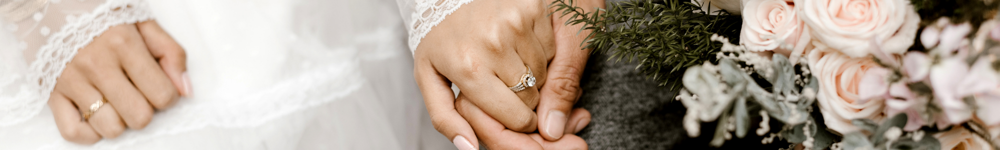 bride and groom holding hands